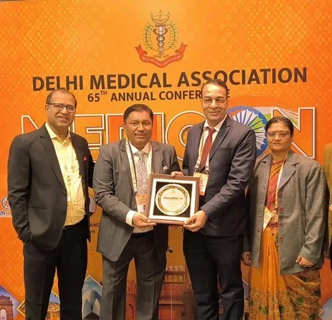 Dr. D.K. Rai receiving recognition at the 65th Delhi Medical Association Annual Conference (MEDICON)